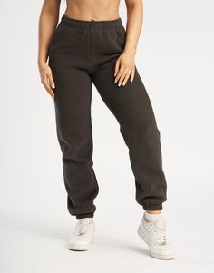 The lounge-to-street look is here. The Basic Jogger Sweatpants are the iconic sweats for a staple wardrobe. Featuring an elastic waistband and cuffs matched with a relaxed fit that is laid back but not baggy. Fleece lining on the inside offers the warmth you need all day - Super soft cotton/polyester blend - In-trend relaxed silhouette - Elastic Waistband - Designed to flatter every size - Worn by our inhouse team for the perfect fit 62% Cotton, 38% Polyester Bella is wearing a Small She is 170c Solid Color Joggers With Elastic Cuffs For Streetwear, Solid Joggers With Elastic Cuffs For Streetwear, Sportswear Sweatpants With Elastic Cuffs For Streetwear, Solid Color Sweatpants With Elastic Cuffs For Streetwear, Solid Sweatpants With Elastic Cuffs For Streetwear, Relaxed Fit Joggers With Elastic Cuffs For Streetwear, Athleisure Streetwear Joggers With Elastic Cuffs, Athleisure Joggers With Elastic Cuffs For Streetwear, Urban Sweats With Elastic Waistband For Streetwear