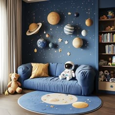 a child's room decorated in blue and yellow with space themed wallpapers