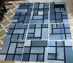 a blue and black area rug on the floor