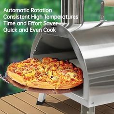 a pizza is being cooked on an outdoor grill with the words automatic rotation constant high temperature times and effort saver quick and even cook