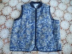 Indigo Blue nylon/poly puffer vest, lightweight, gorgeous blues with floral design, Navy trim accent, Zip front & 2 huge front pockets, size Large, see measurements. Perfect for travel and that extra warmth, this cute vest also has an internal pocket that zips tight. Made by Coldwater Creek SIZE: Large to Extra Large Measurements are taken with the garment laid flat and from side to side in inches. The shoulder to shoulder measurement is taken from one shoulder sleeve seam to the other . Sho Cute Vest, Lightweight Vest, Cotton Vest, Vest Outfits, Coldwater Creek, Chunky Sweater, Puffer Vest, Indigo Blue, Womens Vest