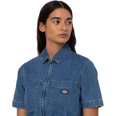 Every wardrobe needs a denim jumpsuit. Our Houston denim coveralls are crafted from 100% cotton denim for an all-season staple thats made to last. The timeless piece offers a utility-inspired aesthetic with its functional chest pockets and zippered front closure. The short sleeve coveralls have a stretchy waistband for a flattering fit. Workwear Denim Button-up Jumpsuit With Button Closure, Medium Wash Denim Button-up Jumpsuit With Buttoned Pockets, Medium Wash Button-up Denim Jumpsuit With Buttoned Pockets, Medium Wash Button-up Denim Jumpsuit, Utility Button-up Denim Jumpsuit, Denim Coverall, Summer Clearance, Denim Jumpsuit, Classic Blue