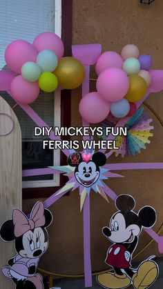 mickey mouses fun ferris wheel with balloons and minnie mouse on the front door for sale