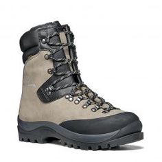 the men's hiking boot is made from canvas and leather with an insulated rubber sole