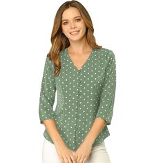 Are you looking for a stylish and comfortable top that you can wear during Spring and Summer? Check out this Regular-Fit V-neck top! It's made from lightweight fabric, making it perfect for warm weather. The elegant v-neckline and special three-quarter sleeves add a touch of sophistication to the retro polka-dot blouse. You can dress it up with heels or keep it casual with sandals. Try to pair it with denim jeans, shorts, or skirts for a chic look that will take you from day to night. Polka Dot Long Sleeve Tops With Button Closure, Green 3/4 Sleeve Top For Work, Green Top With 3/4 Sleeves And Button Closure, Casual Blouse With 3/4 Sleeves And Buttons, Casual Polka Dot Tops With Buttons, Casual Polka Dot V-neck Blouse, Casual Green 3/4 Sleeve Shirt, Casual Green Shirt With 3/4 Sleeves, Casual Polka Dot Button-up Blouse