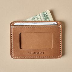 The Pickers Wallet by WP Standard is made of 100% full-grain leather and includes a single cash pocket, three credit card holders, a see-through ID slot, and a pocket sized just right for a single guitar pick (in case you want to break out in song on a whim). Leather Wallets With Id Window, Leather Wallet With Id Window For Everyday Use, Leather Wallets With Id Window For Everyday, Credit Card Holder, Guitar Pick, Full Grain Leather, Leather Craft, Stocking Stuffers, Coffee Lover