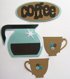 coffee themed magnets are displayed on a refrigerator