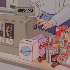 a person standing in front of a machine with food on it and an alarm clock