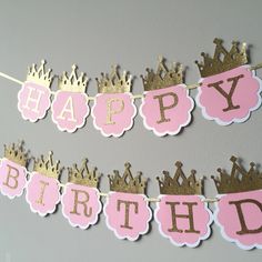 happy birthday banner with pink and gold crowns