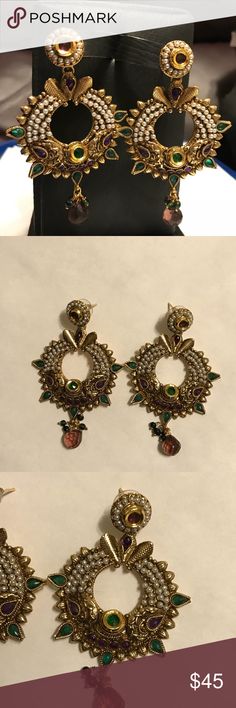 Indian gold earrings pearl red green purple stones Indian long  antique style gold earrings with pearls and red green purple stones, new without tags. About 3 inches long Jewelry Earrings Purple Jeweled Earrings As Gift, Purple Jeweled Earrings For Gift, Purple Earrings For Festive Occasions, Purple Festive Earrings For Festivals, Purple Earrings For Festivals, Purple Jeweled Dangle Earrings, Traditional Purple Earrings For Celebration, Traditional Purple Dangle Earrings, Multicolor Jeweled Danglers As A Gift