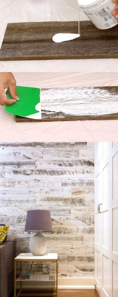 someone is painting wood with green paint on the wall and another person is using a brush