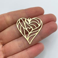 Material : Raw Brass Size : 30x32mm Hole Size : 1.2mm Thickness : 0.8mm All our products are nickel, lead and cadmium free. Please feel free to contact us if you have any questions.  You can visit our shop for more: https://www.etsy.com/shop/lovelymoonsupplies Metal Heart Earrings For Mother's Day, Mother's Day Metal Heart Earrings, Mother's Day Heart Shaped Metal Earrings, Mother's Day Heart-shaped Metal Earrings, Metal Heart Shaped Earrings For Gift, Heart-shaped Metal Earrings For Gifts, Metal Heart Earrings For Gifts, Metal Heart Earrings Perfect As A Gift, Metal Heart Pendant Earrings For Gift