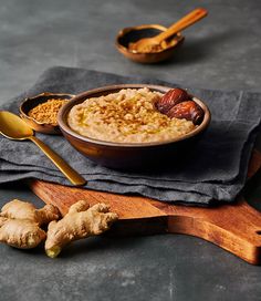 a bowl of oatmeal with ginger and nuts