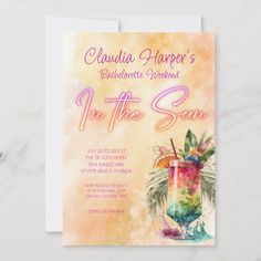 a card with an image of a cocktail and palm tree on the front, in pink