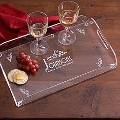 three wine glasses and two crackers on a clear serving tray with the words, the johnsons