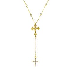 Stand out with this eye catching lariat; Bezel set white zircons are stationed along the chain, followed by a beautiful pave set zircon studded cross, that is reminiscent of a fleur de lis design. This piece is then finished with a tiny pave set zircon dainty cross. Materials: choice of 14K Gold or Rhodium over 925 Sterling Silver. Measurements: Chain that sits around neck measures 16"+2+ extender. The additional chain that hangs from Center cross is additional 2". Center Cross measures .75" top Elegant Cross Lariat Necklace For Gift, Elegant Cross Lariat Necklace With Adjustable Chain, Adjustable Cross Lariat Necklace, Elegant Gold Lariat Necklace With Cross, Elegant Cross Pendant Lariat Necklace With Adjustable Chain, Elegant Crucifix Cross Necklace With Diamond Accents, Silver Cross Lariat Necklace With Adjustable Chain, Elegant Cross-shaped Lariat Necklace With Adjustable Chain, Lariat Necklace