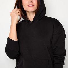 This Xersion women's hoodie is a cozy and versatile piece for casual days. It's made from a super soft fleece cotton-blend and features a regular-fit, a front kangaroo pocket, and long cuffed sleeves. Wear it with leggings and sneakers for lounging, running errands, or outdoor activities. Closure Type: Pullover HeadFit: Regular FitNeckline: Hooded NeckPockets: 1 Front Kangaroo PocketSleeve Length: Long SleeveSleeve Style: Cuffed SleeveApparel Length: 27 Inches - FrontFiber Content: 55% Cotton, … Long Sleeve Moisture-wicking Hoodie Athleisure, Black Long Sleeve Breathable Hoodie, Stretch Moisture-wicking Long Sleeve Hoodie, Black Sweat-resistant Sporty Hoodie, Black Moisture-wicking Fleece Hoodie, Cuff Sleeves, Long Sleeve Hoodie, Running Errands, Black Hoodie