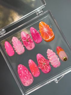 Hand painted gel press ons, made to order. Pink and orange tropical themed nails with 3D fruit and flowers.Medium almond shown in images. Each press on set comes with a set of application tools. I recommend ordering a sizing kit to know your nail size! Beach Aura Nails, 3d Nail Art Fruit, Beach Orange Nails, Nails Theme Ideas, Almond Seashell Nails, 3d Orange Nails, Nail 3d Art, Pink And Orange Hibiscus Nails, Fruit Almond Nails