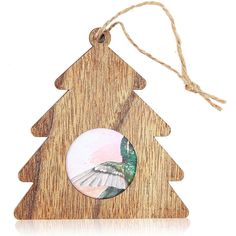 a wooden christmas tree ornament with a bird on it's side and a string hanging from the top