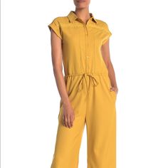 Nwt One One Six Short Sleeve Front Button Jumpsuit In Mustard Size Small ***The Drawstring Is Missing And There Is A Snag On The Bottom Right Pant Leg*** A Lace Knit Trim, Solid Exterior, And Short Sleeves Completes This Jumpsuit. - Pointed Collar - Partial Front Button Closure - Short Sleeves - Drawstring Waist - 2 Side Pockets - Lace Knit Trim - Solid - Approx. 55" Length, 28" Inseam (Size S) Fiber Content 97% Polyester, 3% Spandex Casual Yellow Jumpsuits And Rompers For Work, Casual Collared Jumpsuits And Rompers For Work, Fitted Orange Jumpsuits And Rompers For Work, Fitted Orange Jumpsuits For Work, Orange Jumpsuits And Rompers For Work, Yellow Jumpsuits And Rompers For Spring Workwear, Spring Yellow Jumpsuits And Rompers For Workwear, Yellow Jumpsuit For Spring Workwear, Spring Collared Jumpsuits And Rompers With Buttons