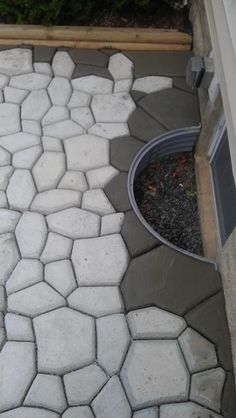 an image of a stone walkway being cleaned