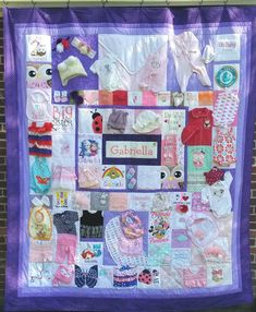 there is a quilt made to look like it has lots of clothes on it and the name garbella