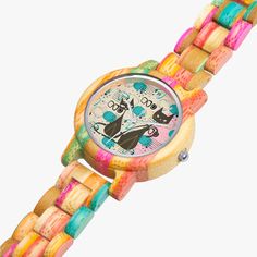 Unleash your inner feline fashionista with the Atomic Cat Wooden Watch. This stylish timepiece combines a colorful camouflage bamboo wristwatch with retro mid century modern flair. Stand out from the pack and add some paws-itive vibes to your wrist game! About Diameter: Ø 38mm Unisex design No water resistance Crafted from pure wooden case and straps Equipped with Japanese CITIZEN movement and SONY battery Key Features Vibrant Green & Pink pattern with randomly dyed wood Lightweight bamboo construction with a smooth finish Advanced CITIZEN movement for accurate timing Easy-to-replace SONY 377 SR626SW (1.55V) battery Note: Avoid exposure to water or wet conditions due to the wooden material of the case and strap. Trendy Multicolor Watches As Gifts, Trendy Multicolor Quartz Watches, Atomic Cat, Bamboo Construction, Retro Mid Century Modern, Wrist Game, Wooden Watch, Pink Pattern, Wooden Case