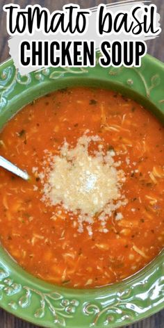 tomato basil chicken soup in a green bowl with parmesan cheese on the top