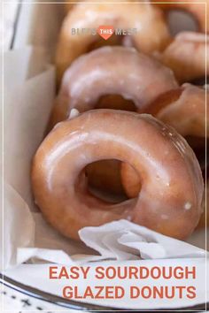 glazed doughnuts in a box with the words easy sourdough glazed donuts