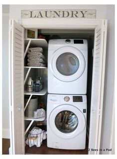 a white washer and dryer sitting inside of a small closet next to each other