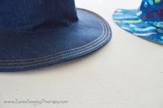 a blue hat sitting on top of a table