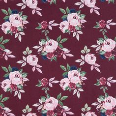 a red floral print fabric with pink and green flowers on the bottom half of it