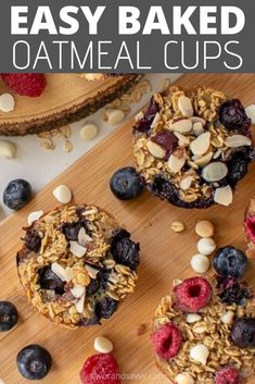 three blueberry baked oatmeal cups on a cutting board with raspberries and almonds