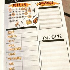 an open planner with some writing on it and pumpkins around the pages, including numbers