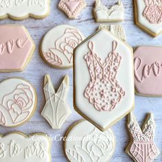 some decorated cookies are sitting on a table