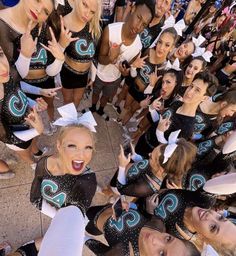 a group of cheerleaders posing for the camera