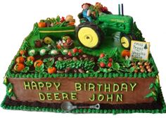 a birthday cake made to look like a farm scene with tractor and farmer on it