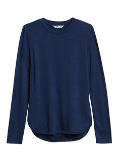 LUXESPUN: Our coziest knit, Luxespun fabric is sweater-soft, stretchy and just a little heavier than a t-shirt.  RELAXED FIT: Expertly cut for a loose, relaxed fit that’s still pulled together.  HIGH-LOW HEM: An added 1. 5" at back gives you extra coverage.  Crew neck.  Rounded hem.  Relaxed fit.  Long sleeves.  Hip length - designed for mid-rise and high-rise styles.  Front body length (size S): Petite 23", Regular 24. 5" Sleeve length from center back: Petite 29", Regular 31" Model: Size XS, 5 Styles For Living Room, Curved Hem Top, High Rise Style, Wool Shirt, Thermal Shirt, Women Long Sleeve Tops, Fall Style, Blue Tshirt, Cozy Knits