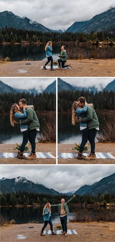 a man and woman hugging each other in front of a lake with mountains behind them