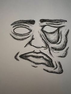 a black and white drawing of a face