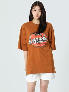 This is a casual and comfortable top by UCLA that is made out of high quality and sturdy material. With distinctive mood of the design and comfortable wear, you can style it for your casual daily outfit.- Graphic artwork print on the front chest- Soft and sturdy cotton 100% fabric- Casual and comfortable mood Oversized Brown T-shirt With Letter Print, Casual Brown Graphic T-shirt, Brown Relaxed Fit Tops With Text Print, Trendy Brown Relaxed Fit T-shirt, Graphic Cotton Jersey T-shirt With Letter Print, Brown Text Print Crew Neck T-shirt, Retro Cotton Tops For Streetwear, Brown Crew Neck T-shirt With Text Print, Urban Cotton Graphic Print Top