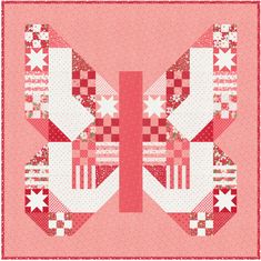 a pink and white quilted butterfly with stars on it's wings is shown