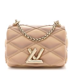 This is an authentic LOUIS VUITTON Lambskin Malletage Pico GO-14 in Beige and Pink. This cross-body shoulder bag is crafted of soft quilted embossed lambskin leather in beige. The bag features a gold sliding chain link shoulder strap. The brass LV twist lock opens the flap to a beige leather interior with a patch pocket. 1408588 Designer Quilted Beige Shoulder Bag, Luxury Quilted Beige Bag, Beige Quilted Leather Shoulder Bag, Beige Quilted Evening Bag, Luxury Evening Shoulder Bag With Diamond Quilting, Luxury Diamond-quilted Shoulder Bag For Evening, Luxury Diamond-quilted Evening Shoulder Bag, Beige Quilted Evening Shoulder Bag, Designer Evening Shoulder Bag With Diamond Quilting