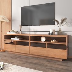 a flat screen tv mounted to the side of a wooden entertainment center in a living room