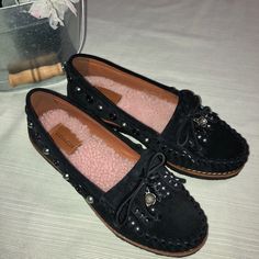 Black Suede Moccasins With Silver Tone Studs And Flower And T-Rex Charms Shearling Style Lining Coach Black Loafers With Round Toe, Black Suede Moccasins For Fall, Casual Coach Loafers With Round Toe, Suede Moccasins, Coach Shoes, T Rex, Moccasins, Black Suede, Black Color