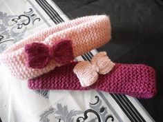 two knitted headbands with bows on them