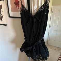 Dolce & Gabanna It Ittierre Black Lace Top. Size Small. Tags Attached But Has Minor Flaws. Please See Photos. Black Lace Tops For Daywear, Black Lace Tops For Loungewear, Elegant Black Loungewear Tops, Elegant Black Tops For Loungewear, Brazil Fits, Silver Bralette, Black Lace Top, Silk Cami, Lace Silk