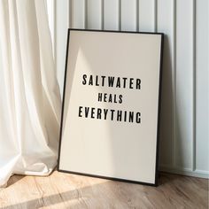 a sign that says salt water heals everything