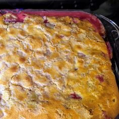 a baked dessert in a metal pan on top of a stove