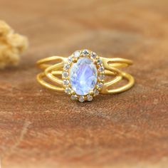 Gold design Gemstone ring for women, Handmade ring, fire moonstone ring, Minimalist ring, Oval moonstone ring, natural fire Moonstone ring, 925 Sterling silver ring, Gift for her.  *Other Similar Jewelry Available Here* https://www.etsy.com/shop/AreebaJewelry Details:- Gemstone - Moonstone  Stone Color Available - Natural White  Stone Setting - Prong Quality - AAA Grade Stone Size - 5 x 7 MM Ring Size - 5 US TO 9 US Available Type - 100% Natural  Shipping service - Free worldwide shipping service About AreebaJewelry:- AreebaJewelry takes great pride in the design and craftsmanship of our fine jewelry pieces. We use only the finest materials and the highest manufacturing standards. We strive to make sure every jewelry piece we design is perfect. ♥️ More Matching collections are available to Gift Moonstone Ring With Halo Setting, Moonstone Ring With Halo Setting, Gold Moonstone Ring With Halo Setting, Moonstone Halo Ring For Gift, Moonstone Jewelry With Halo Setting As Gift, Moonstone Stone, White Rainbow, Ring Minimalist, Minimalist Ring